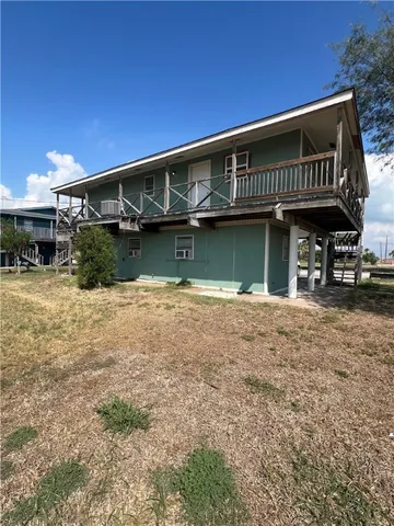 a view of a house with a balcony
