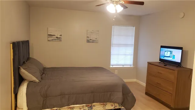 a view of a refrigerator in kitchen and a dishwasher