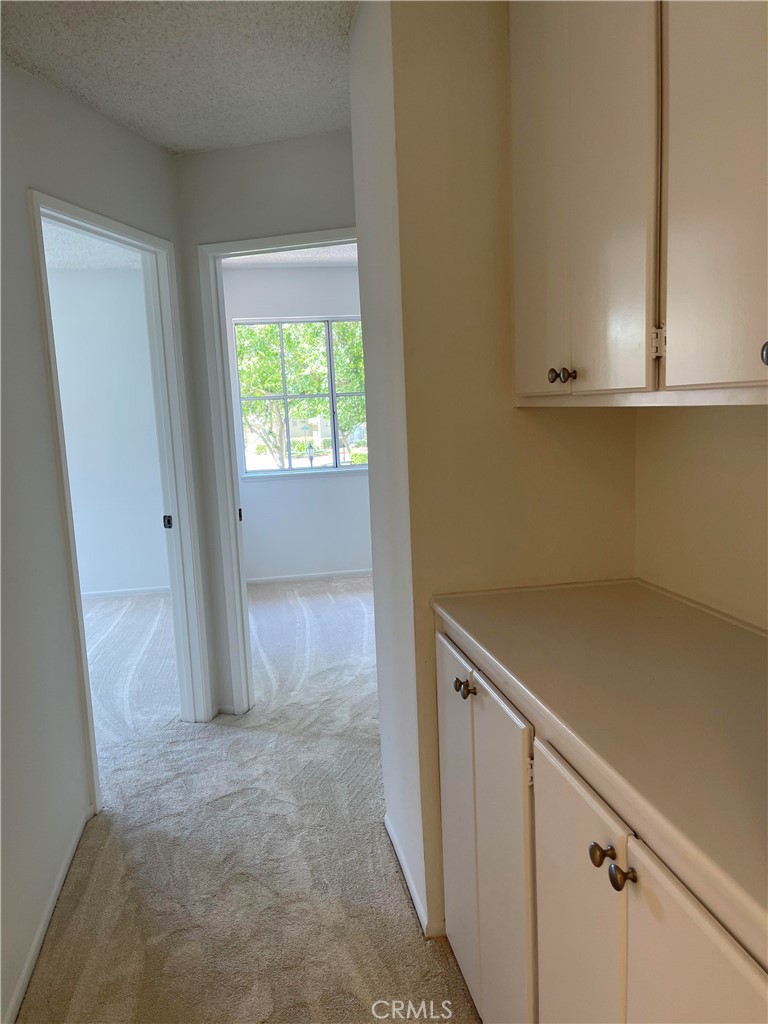 26445 Dunsmore, Unit 2 Lake Forest, CA 92630 - Photo 22 of 36 a view of cabinets and window