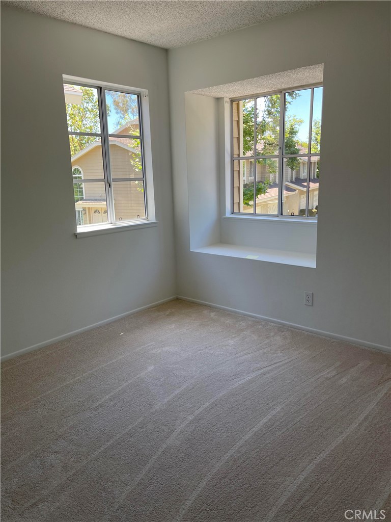 26445 Dunsmore, Unit 2 Lake Forest, CA 92630 - Photo 23 of 36 an empty room with a window