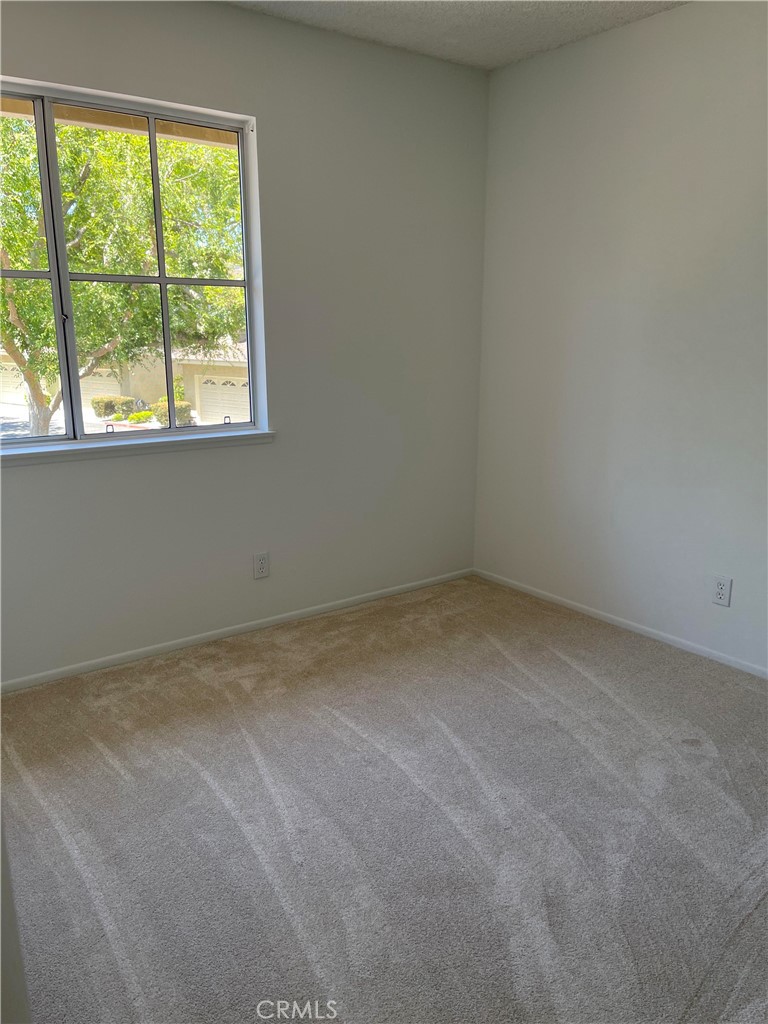26445 Dunsmore, Unit 2 Lake Forest, CA 92630 - Photo 24 of 36 an empty room with a window