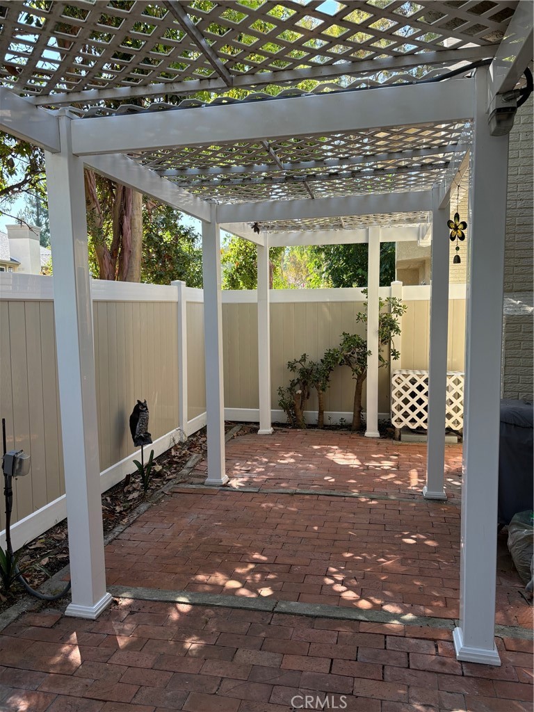 26445 Dunsmore, Unit 2 Lake Forest, CA 92630 - Photo 30 of 36 a view of a room with gym equipment