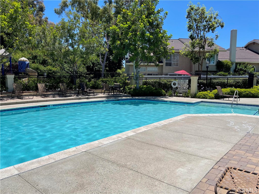 26445 Dunsmore, Unit 2 Lake Forest, CA 92630 - Photo 34 of 36 a front view of a house with garden