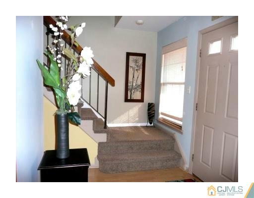 1203 Timber Oaks Road Edison, NJ 08820 - Photo 14 of 25 a view of entryway and hall with a vase
