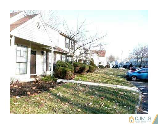 1203 Timber Oaks Road Edison, NJ 08820 - Photo 22 of 25 a view of a house with a yard