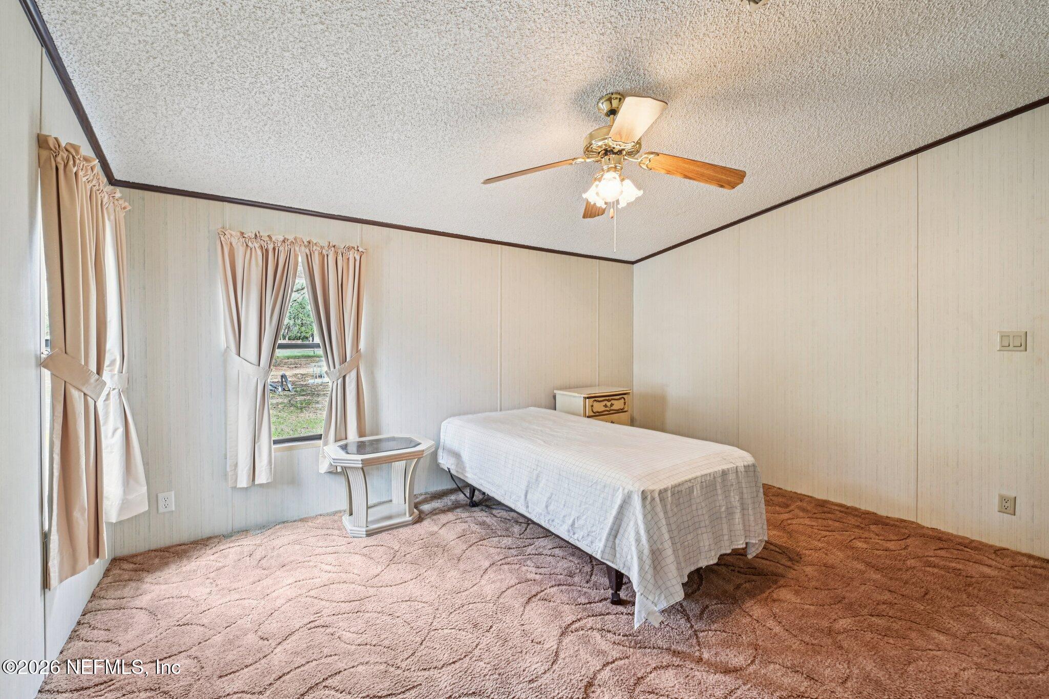 128 Sesame Street Middleburg, FL 32068 - Photo 40 of 66 Large Guest Bedroom