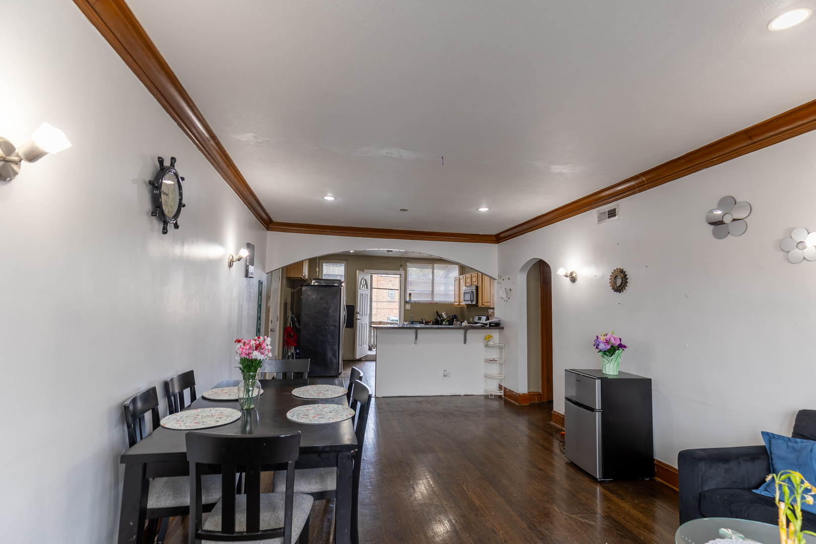 5820-24 West Roosevelt Road Chicago, IL 60644 - Photo 15 of 25 a view of a dining room with furniture and wooden floor