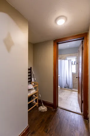 a view of an entryway with wooden floor