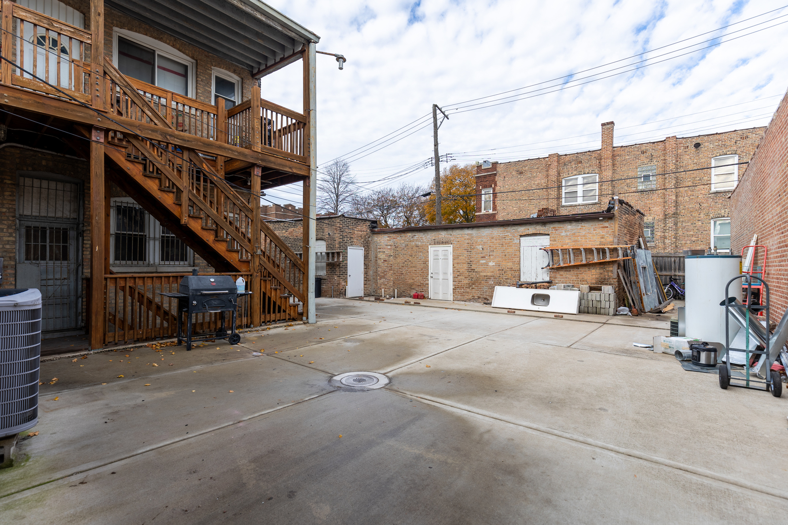 5820-24 West Roosevelt Road Chicago, IL 60644 - Photo 20 of 25 a view of a street with seating area