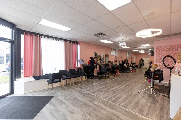a view of a room with gym equipment and a large window