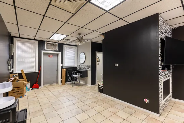 a room with furniture and a flat screen tv