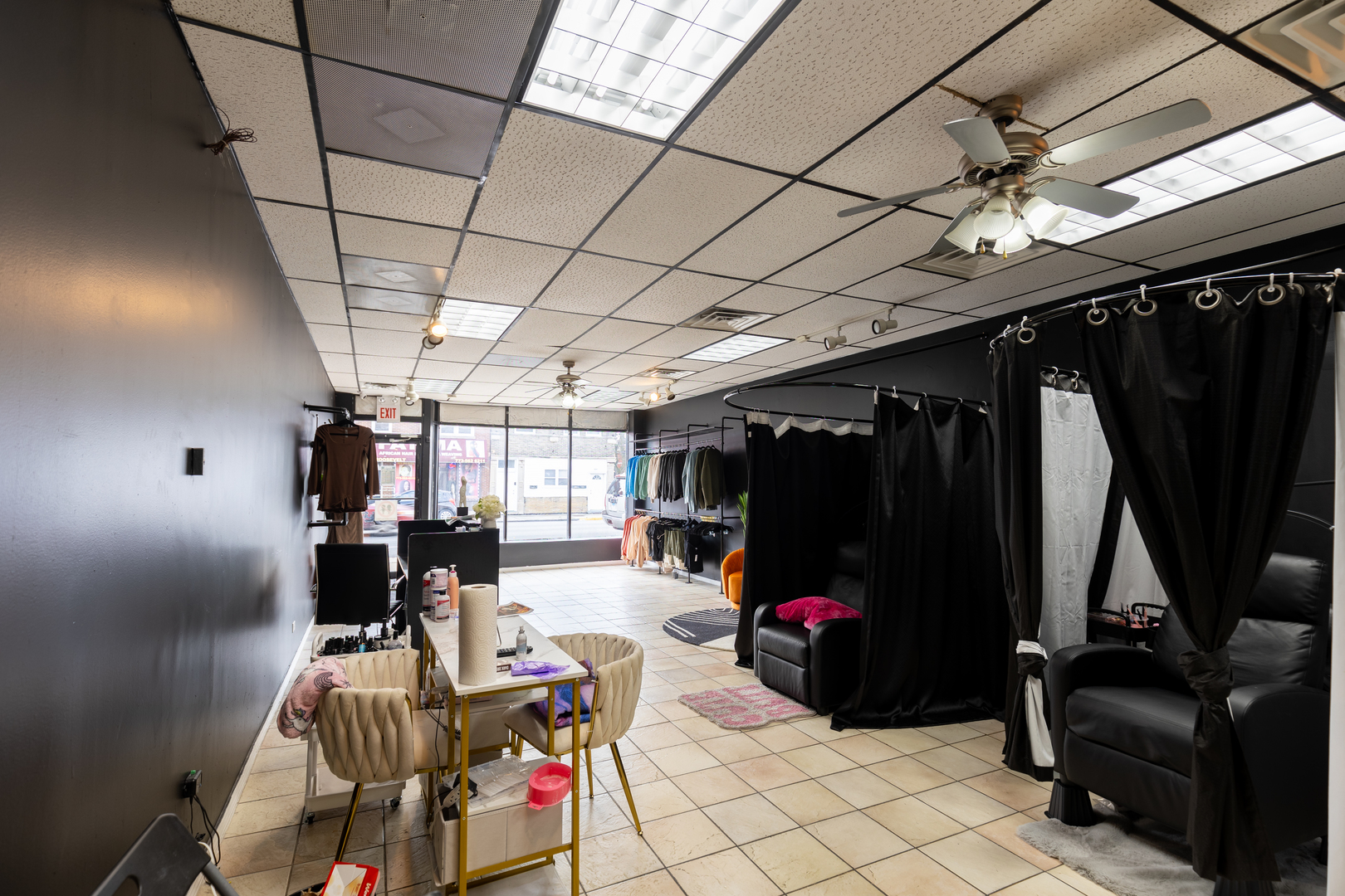 5820-24 West Roosevelt Road Chicago, IL 60644 - Photo 8 of 25 a living room with lots of furniture and storage