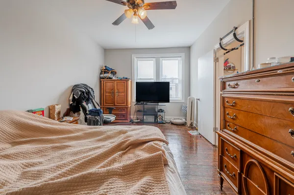 a view of a livingroom with furniture and a flat screen tv