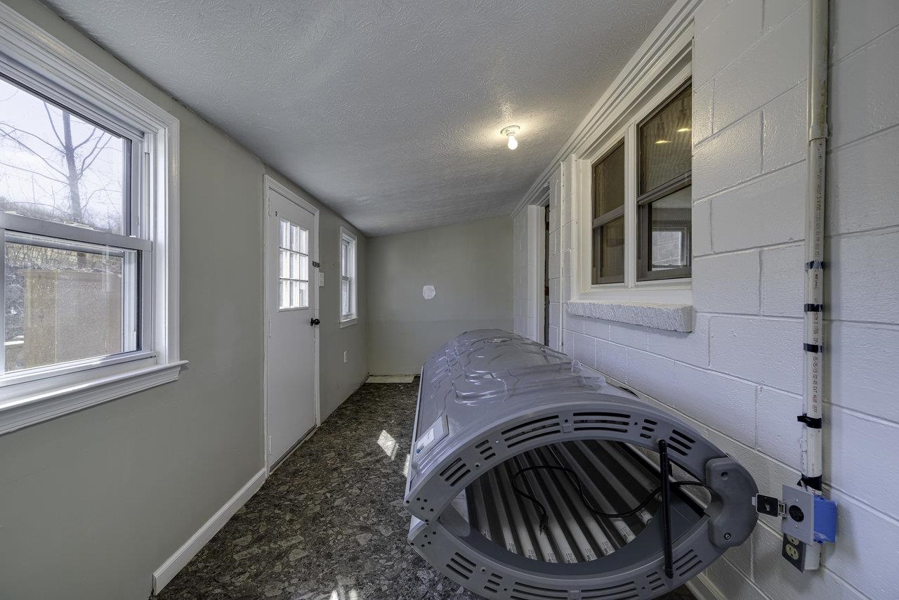 2355 Pine Grove Road Stanley, VA 22851 - Photo 16 of 25 a view of a livingroom with washer and dryer