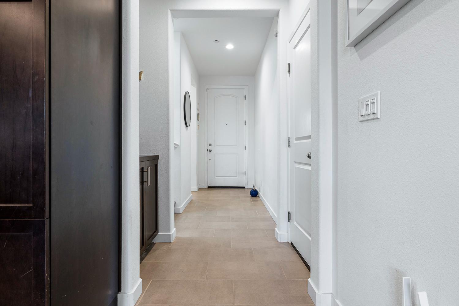 4286 Oak Knoll Road Madera, CA 93636 - Photo 15 of 43 a view of a hallway with wooden shelves