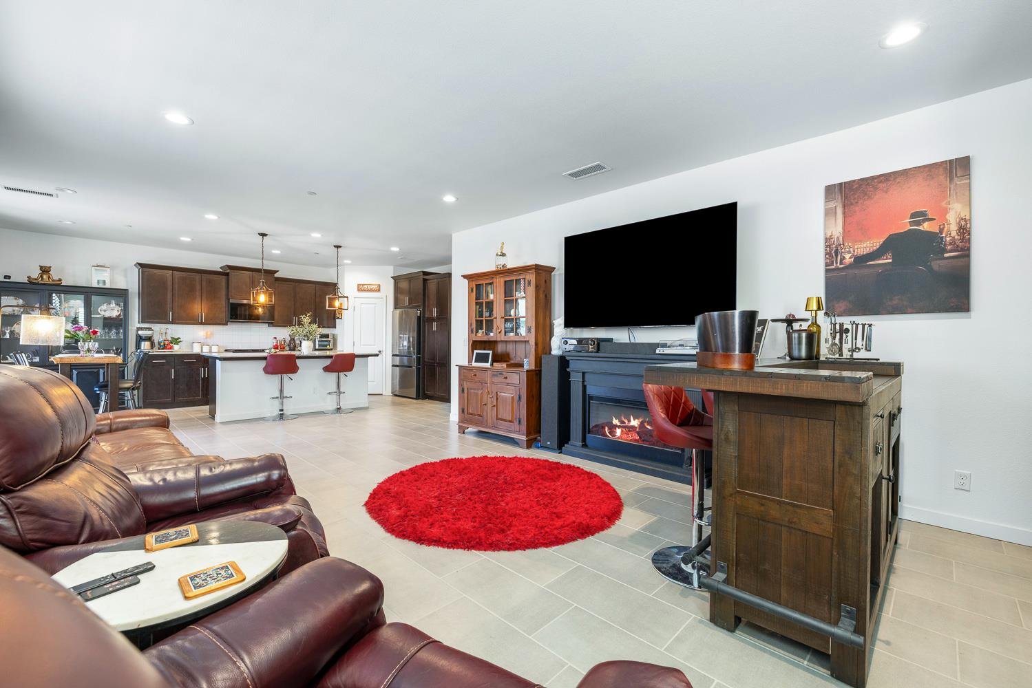 4286 Oak Knoll Road Madera, CA 93636 - Photo 24 of 43 a living room with furniture and a flat screen tv