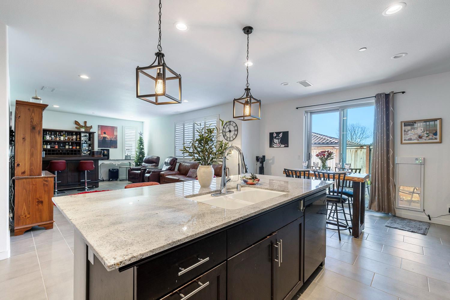 4286 Oak Knoll Road Madera, CA 93636 - Photo 27 of 43 a kitchen with a counter space cabinets and wooden floor