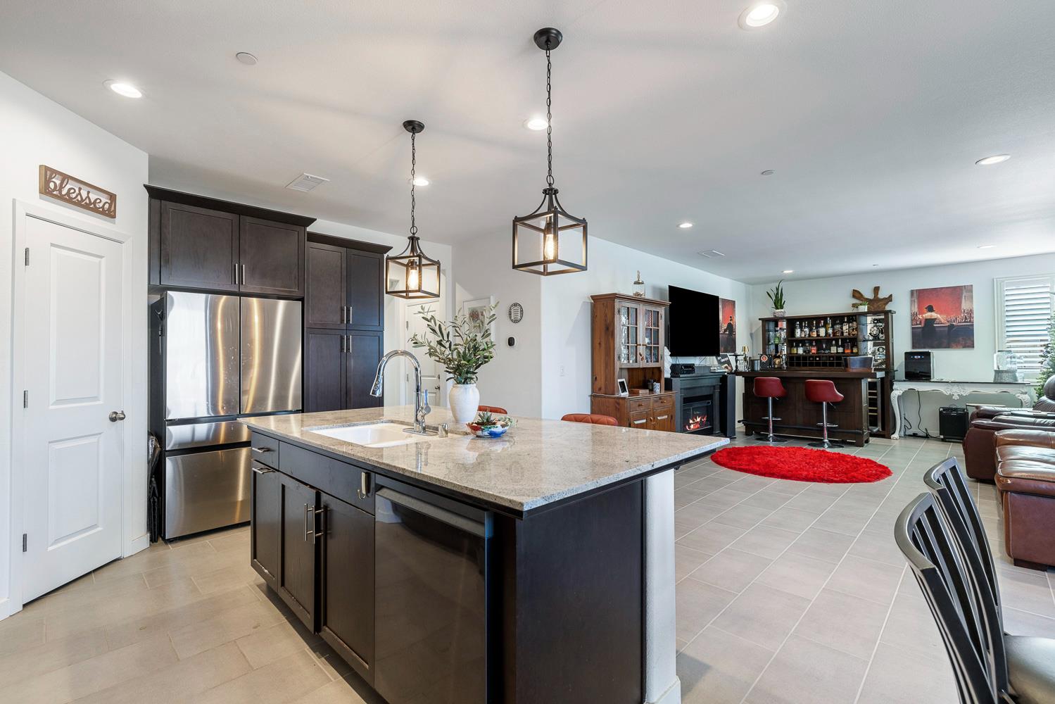 4286 Oak Knoll Road Madera, CA 93636 - Photo 29 of 43 a kitchen that has a lot of cabinets and refrigerator