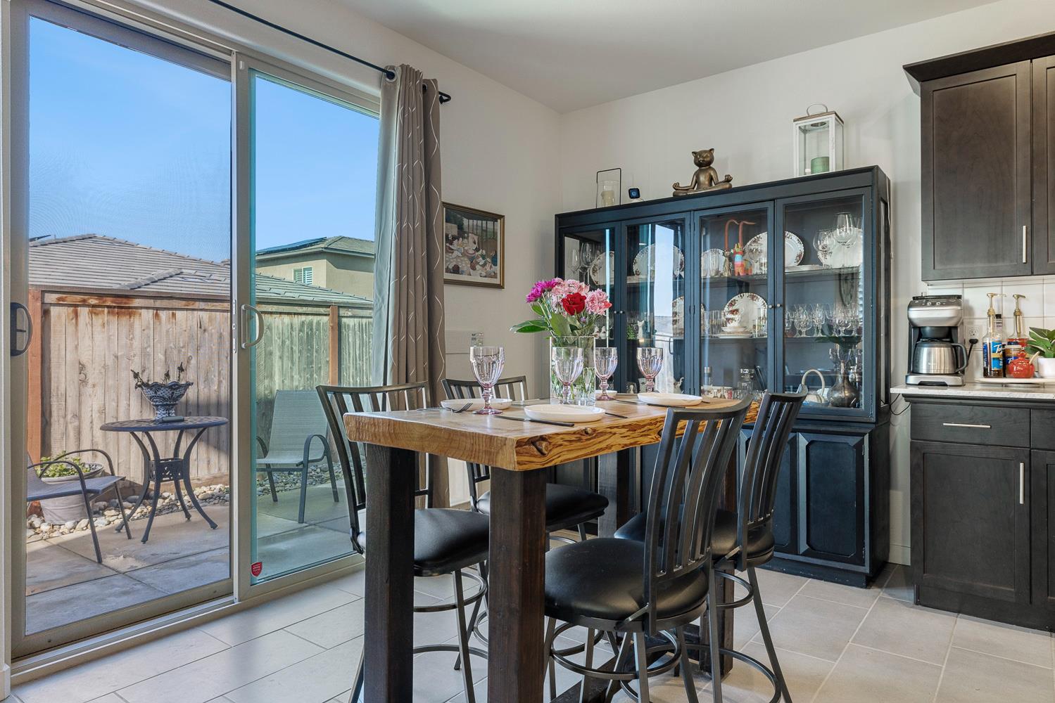 4286 Oak Knoll Road Madera, CA 93636 - Photo 30 of 43 a view of a dining room with furniture window and outside view