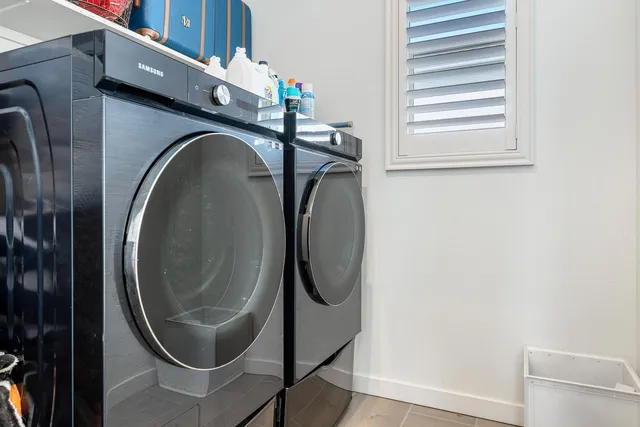 a bedroom with a bed and furniture