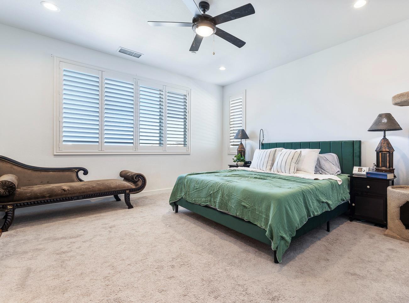 4286 Oak Knoll Road Madera, CA 93636 - Photo 34 of 43 a bedroom with a bed and furniture