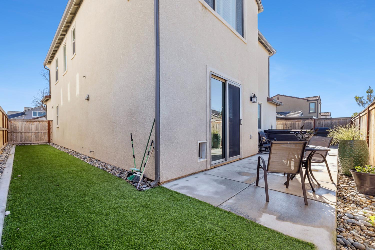 4286 Oak Knoll Road Madera, CA 93636 - Photo 40 of 43 a view of a backyard with furniture and a garden