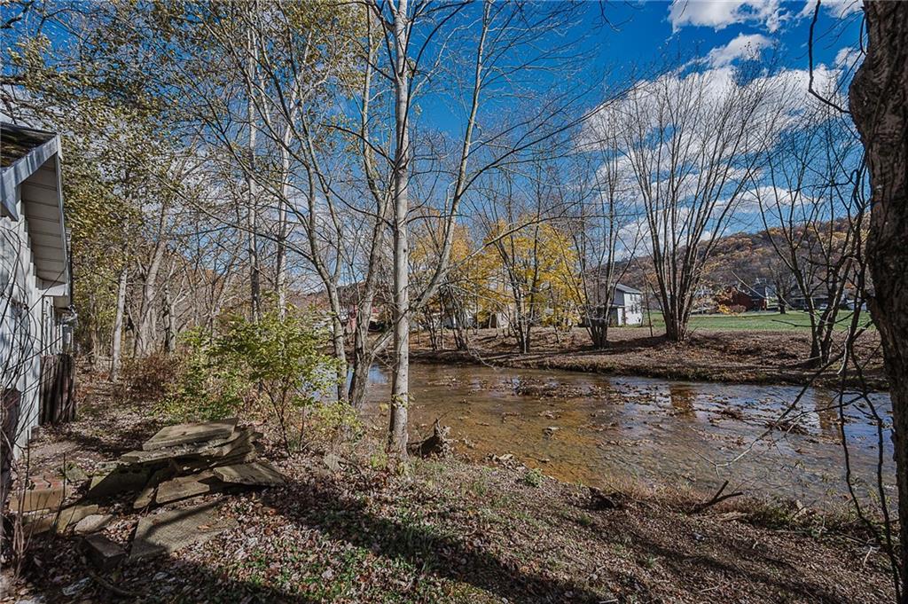349 Adams Street Clymer, PA 15728 - Photo 21 of 33 Bank of Twolick Creek; property sits well above bank of creek