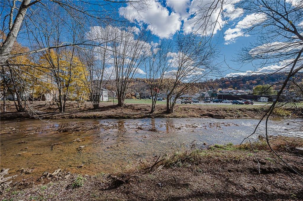 349 Adams Street Clymer, PA 15728 - Photo 22 of 33 View is on bank level; property sits well above bank of the creek