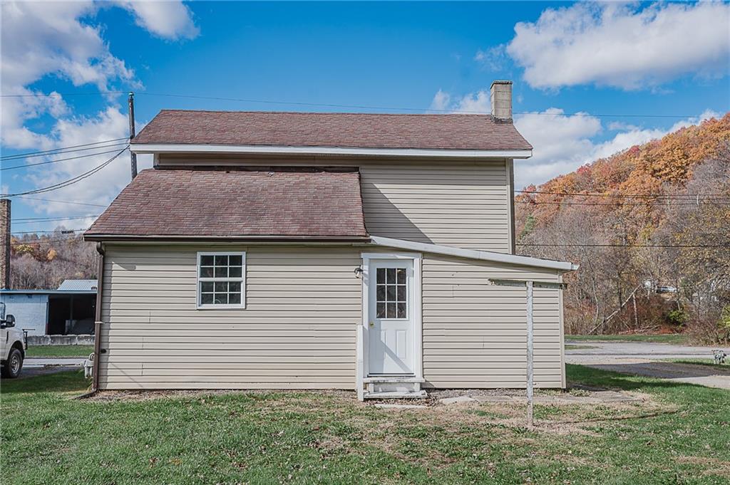 349 Adams Street Clymer, PA 15728 - Photo 24 of 36 a view of a house with a yard