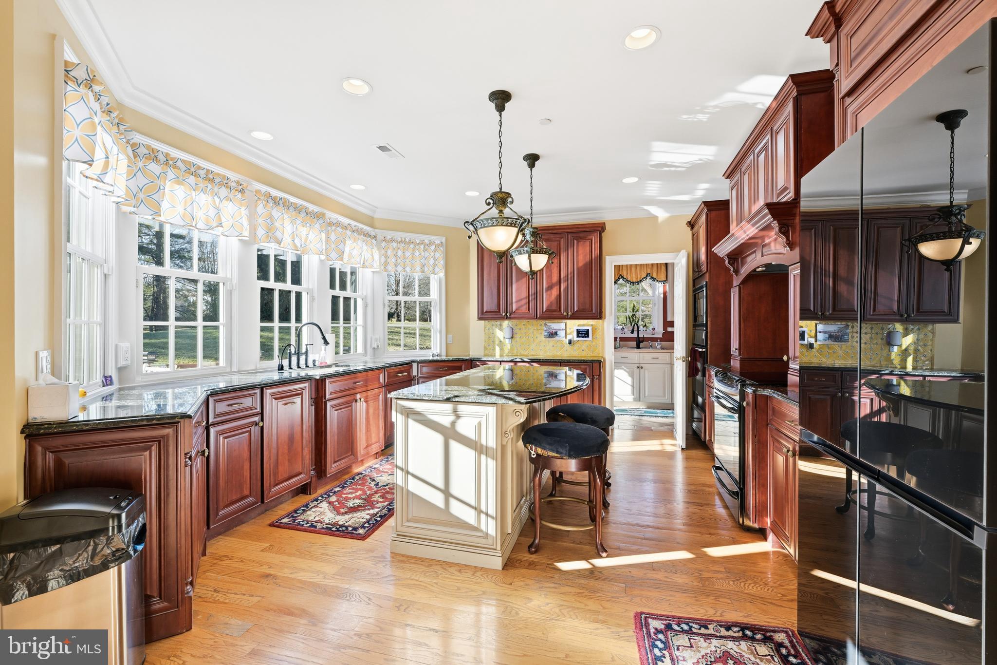 171 Firecreek Road Newtown, PA 18940 - Photo 19 of 54 a large kitchen with a table and chairs
