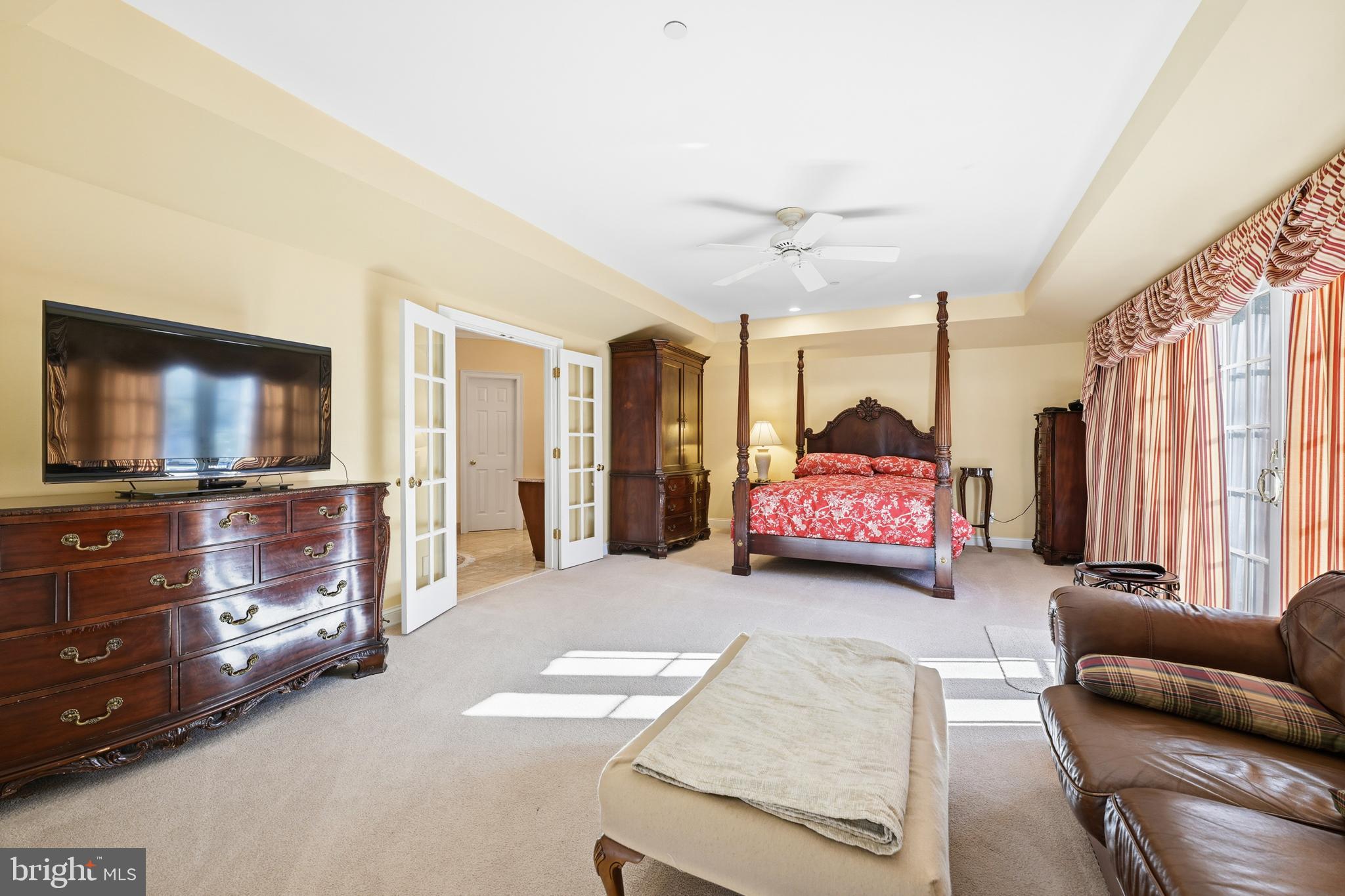 171 Firecreek Road Newtown, PA 18940 - Photo 25 of 54 a living room with furniture and a flat screen tv