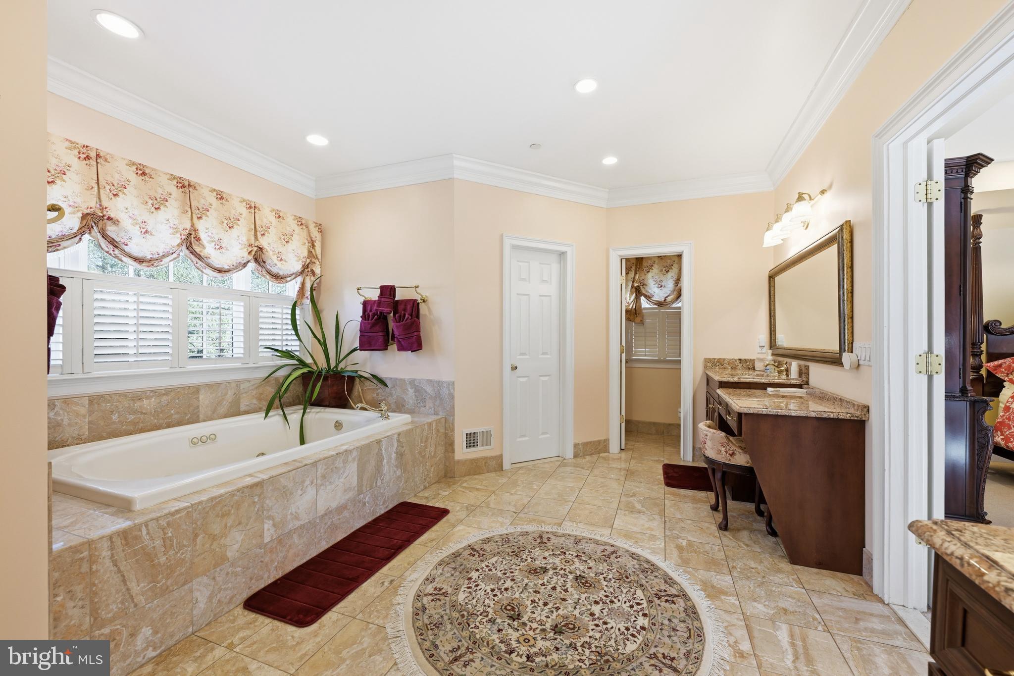 171 Firecreek Road Newtown, PA 18940 - Photo 30 of 54 a spacious bathroom with a tub sink and mirror