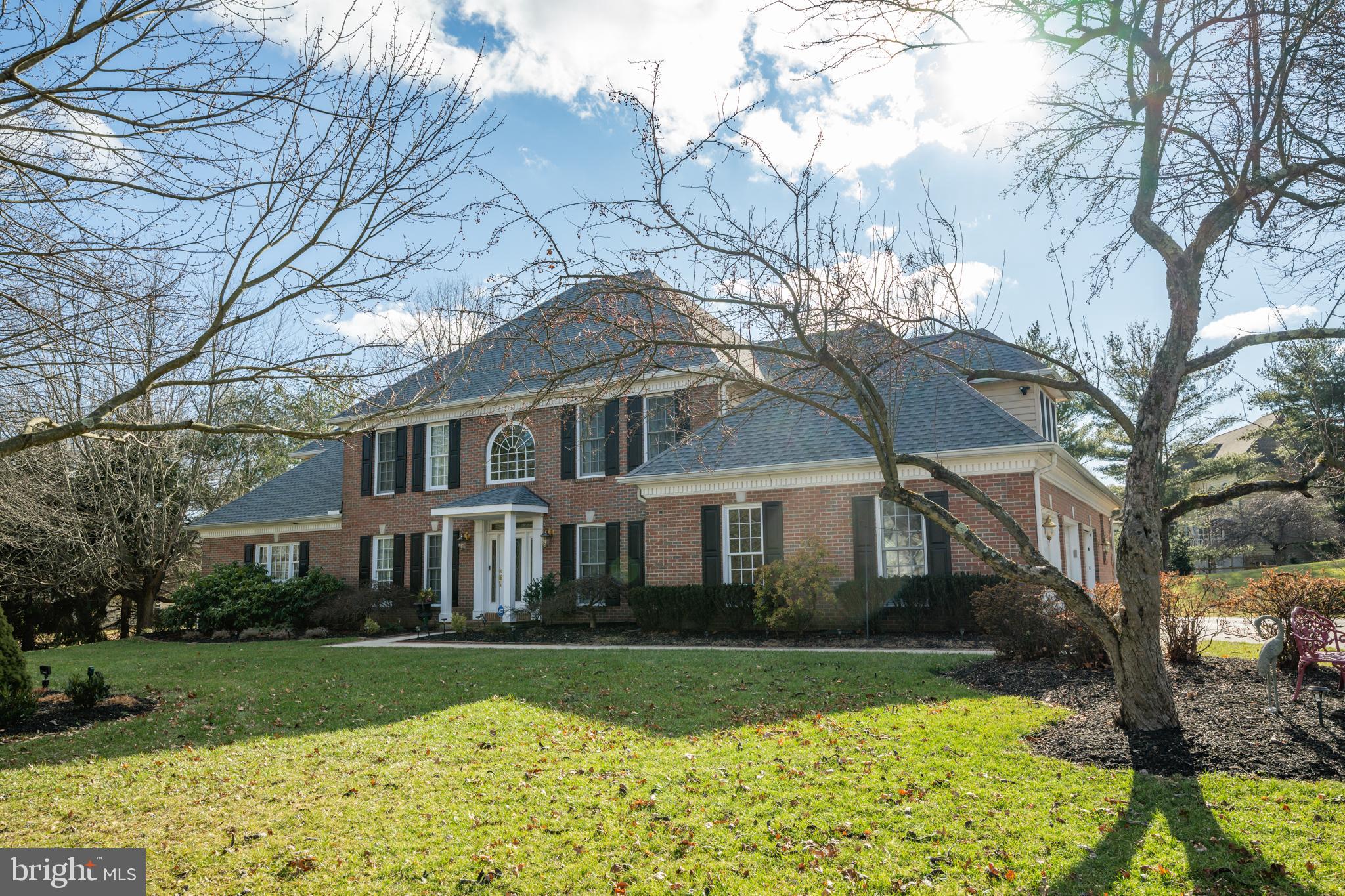 171 Firecreek Road Newtown, PA 18940 - Photo 3 of 54 a front view of a house with yard and green space
