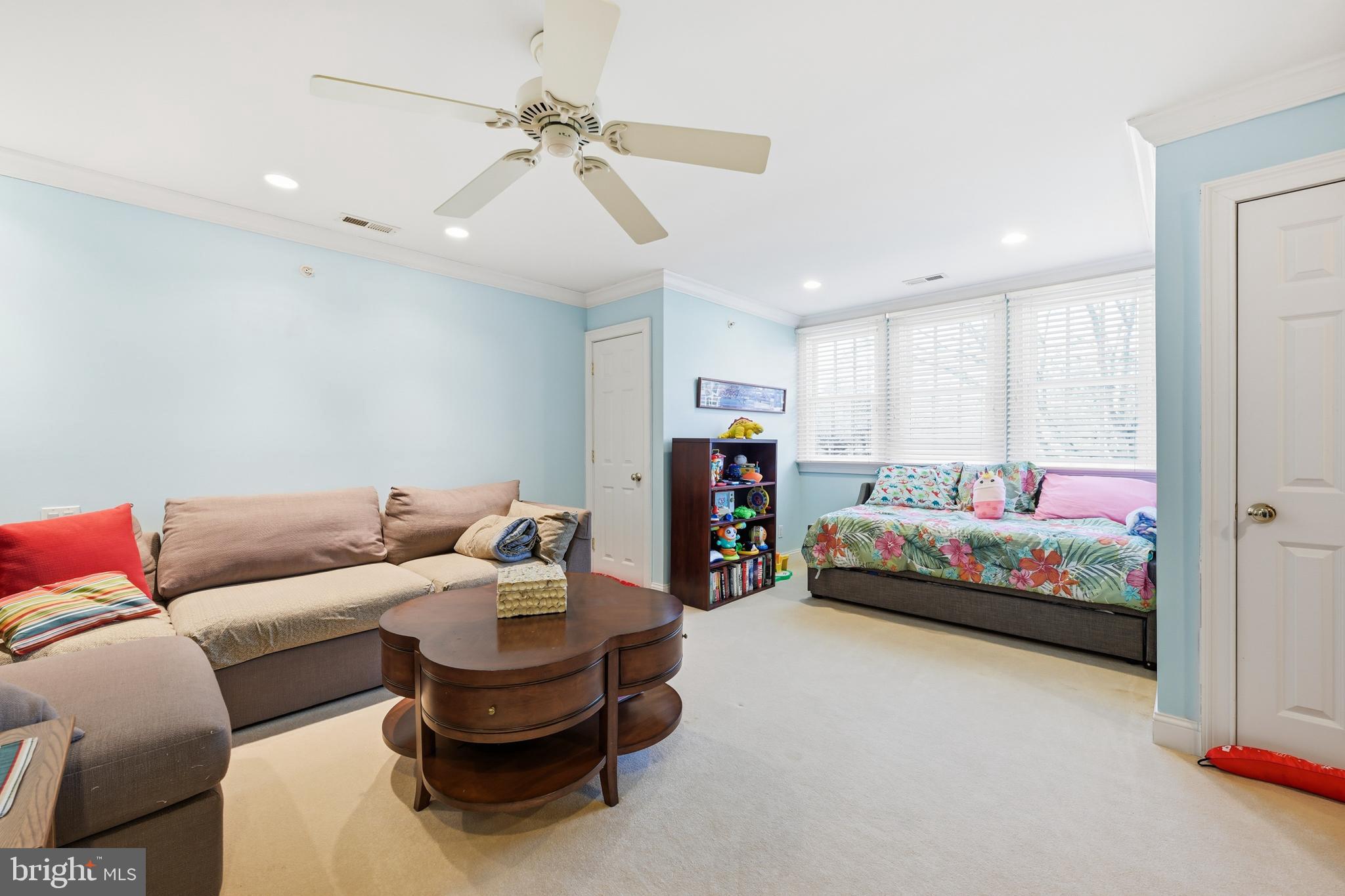 171 Firecreek Road Newtown, PA 18940 - Photo 38 of 54 a living room with furniture and a chandelier