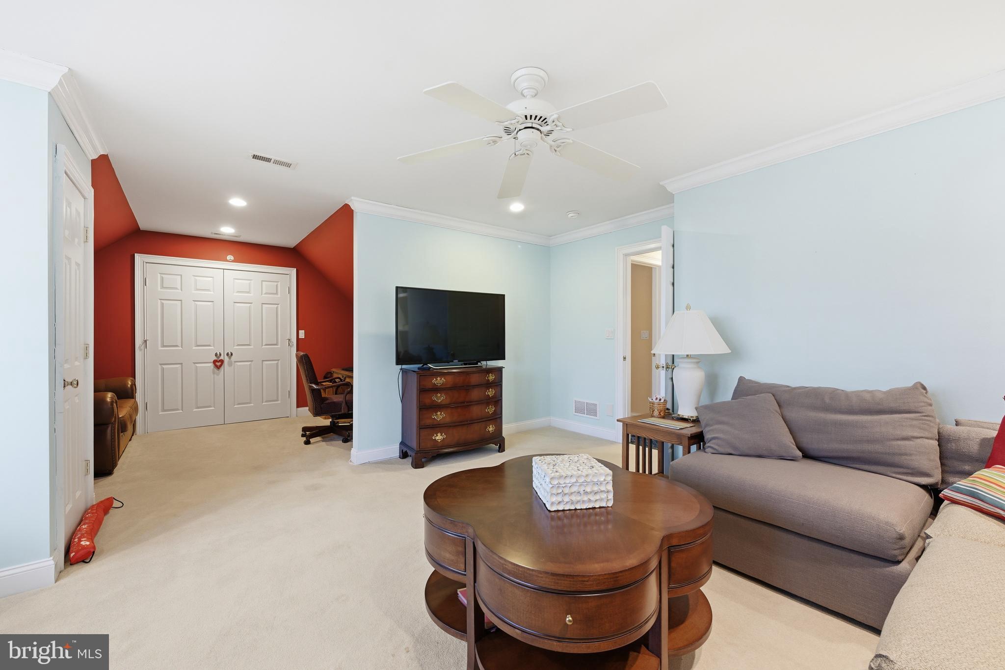 171 Firecreek Road Newtown, PA 18940 - Photo 39 of 54 a living room with furniture and a flat screen tv
