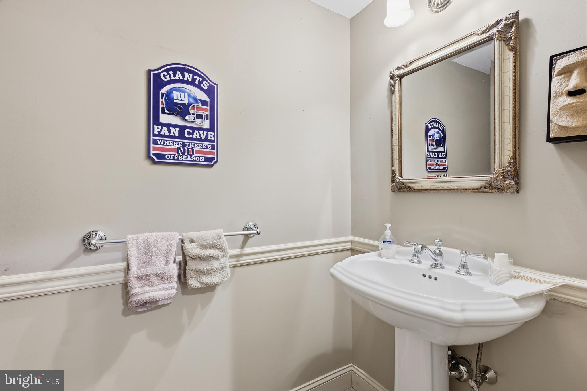 171 Firecreek Road Newtown, PA 18940 - Photo 48 of 54 a bathroom with a sink and a mirror