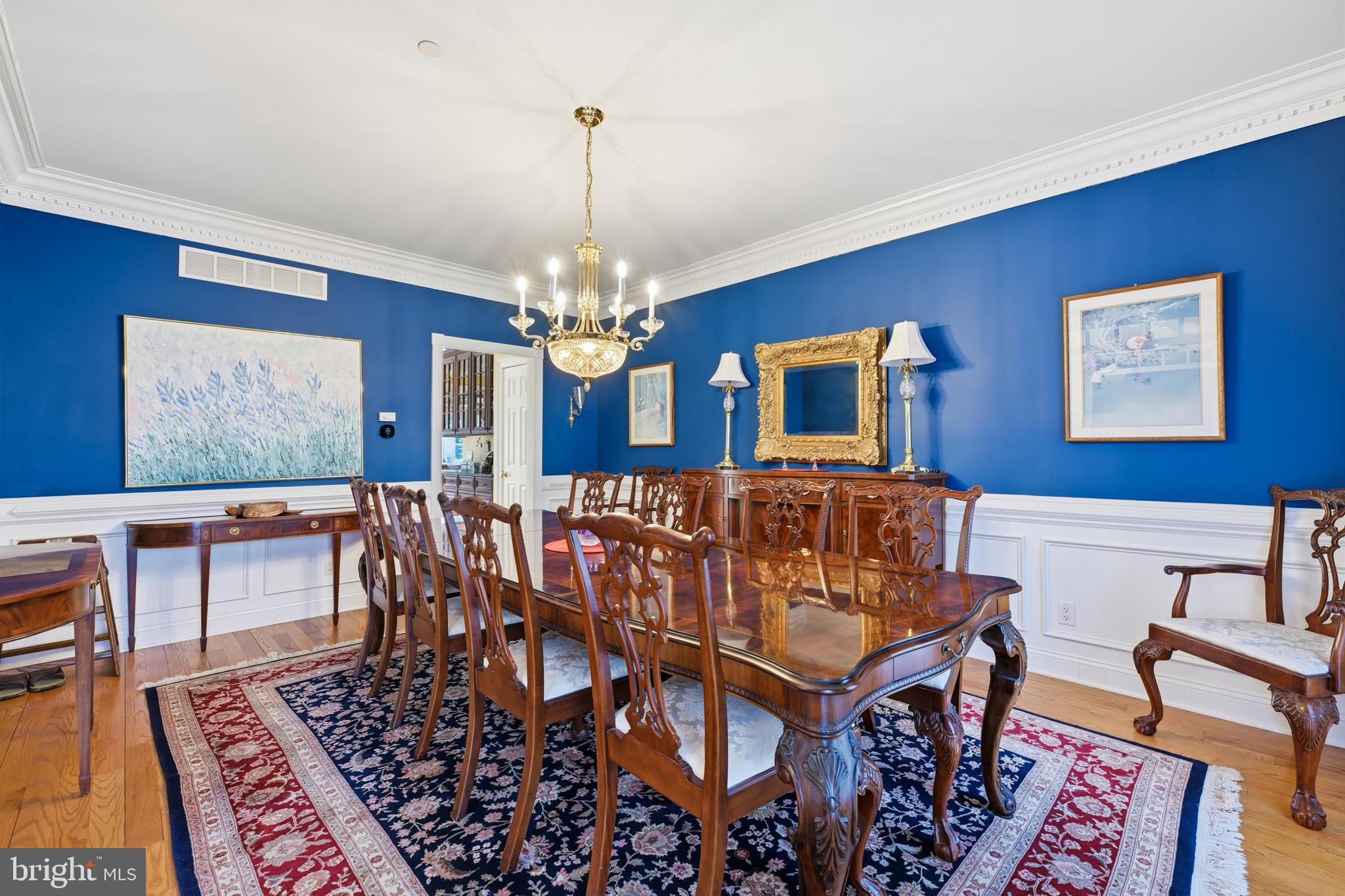 171 Firecreek Road Newtown, PA 18940 - Photo 10 of 54 a view of a livingroom with furniture a chandelier and wooden floor