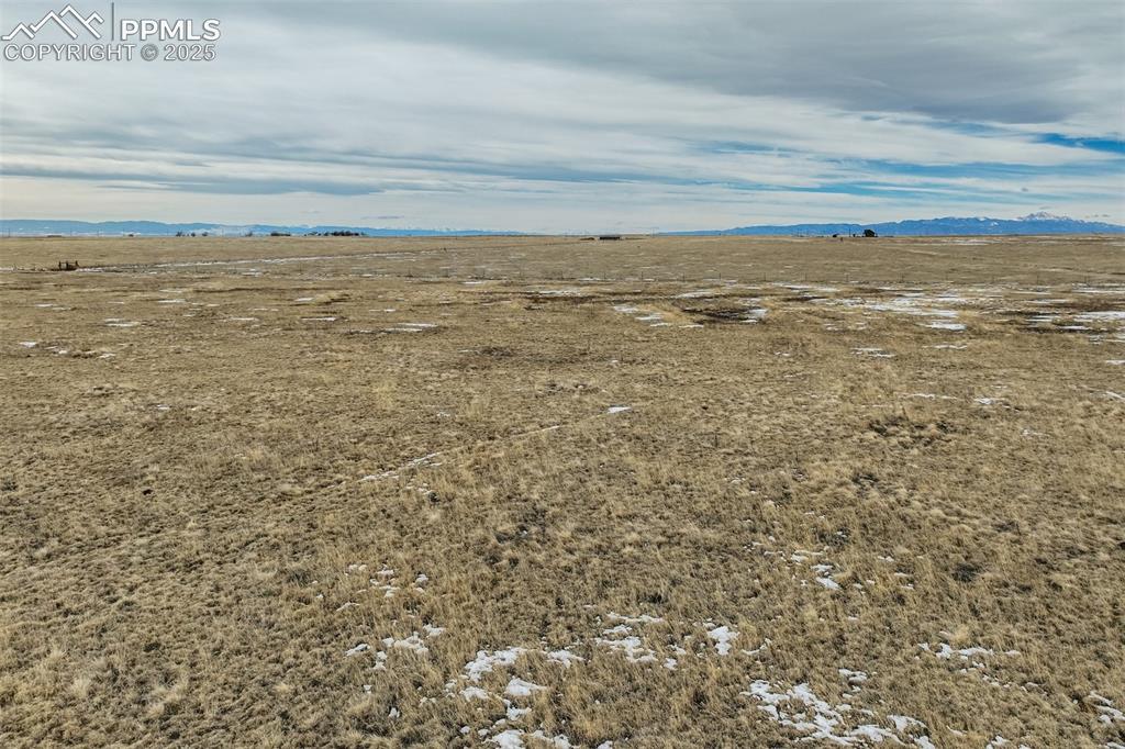 32290 North Neely Road Yoder, CO 80864 - Photo 23 of 26 Property view of water featuring a mountain view