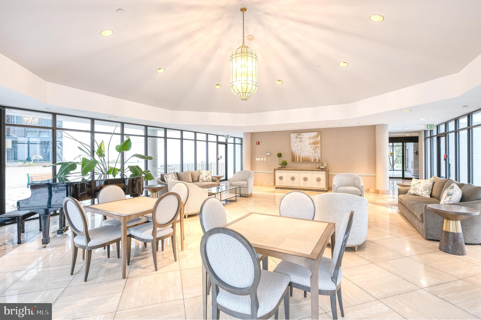4001 Old Court Road, Unit 218 Baltimore, MD 21208 - Photo 32 of 44 a view of a dining room with furniture window and outside view