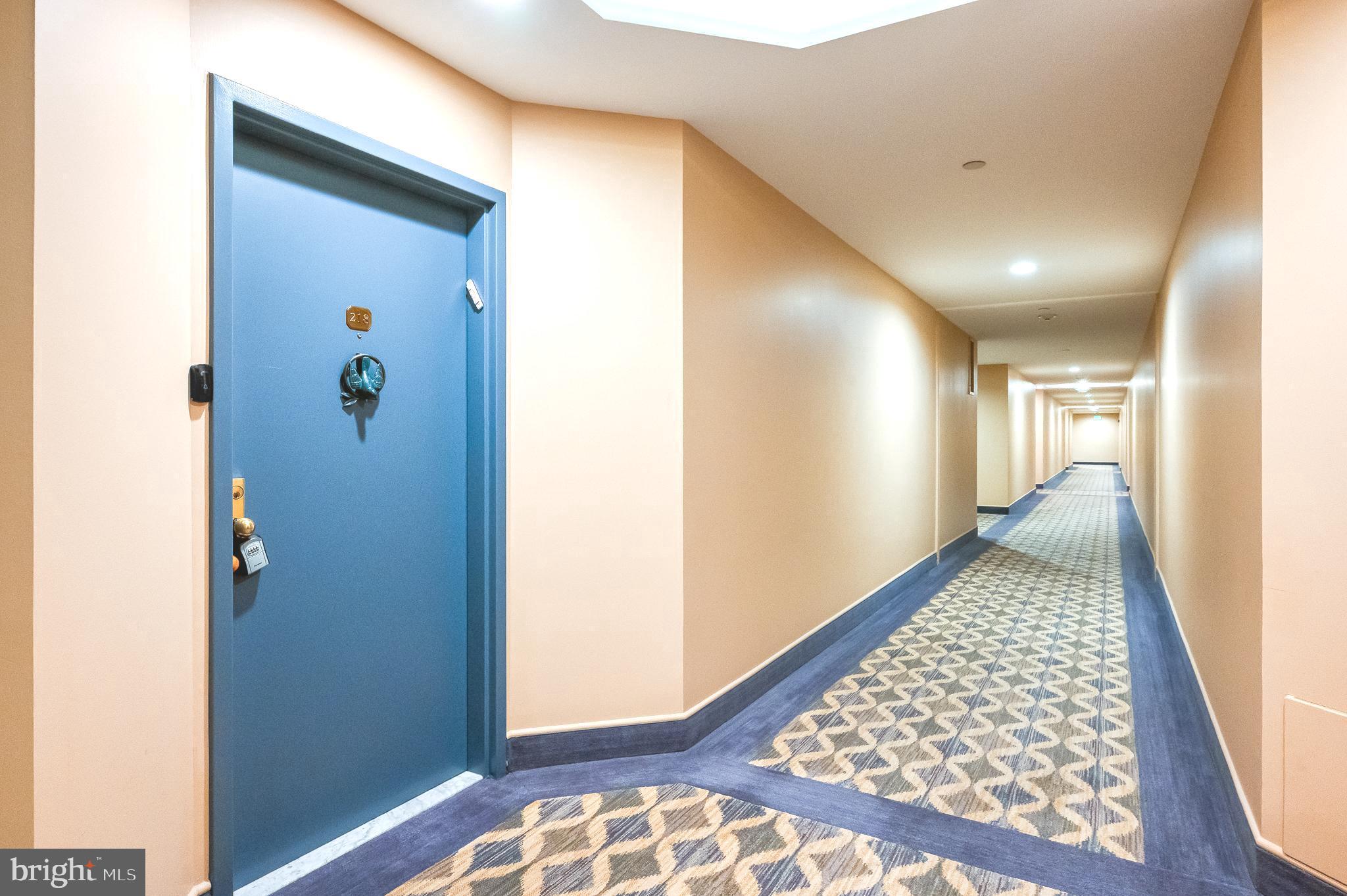4001 Old Court Road, Unit 218 Baltimore, MD 21208 - Photo 33 of 44 a view of hallway with wooden floor