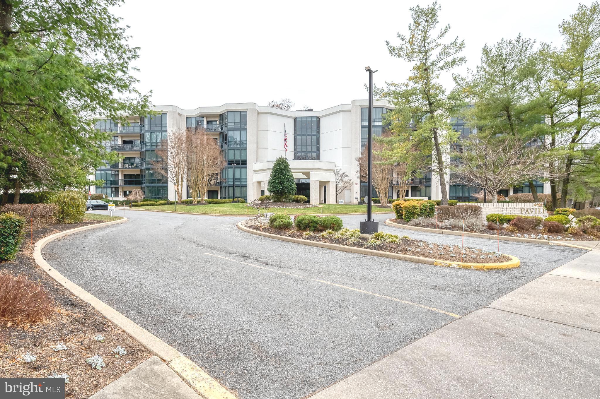 4001 Old Court Road, Unit 218 Baltimore, MD 21208 - Photo 35 of 44 a view of city with tall buildings