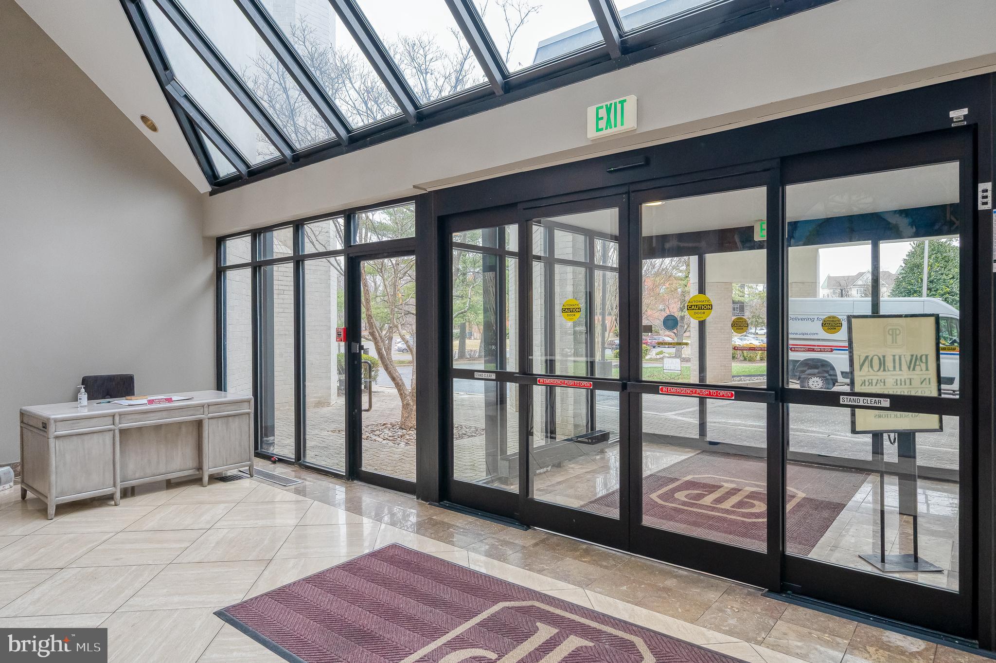 4001 Old Court Road, Unit 218 Baltimore, MD 21208 - Photo 38 of 44 a view of a hallway with furniture and window