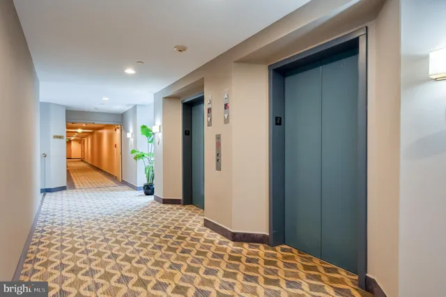 a bathroom with a mirror and a shower