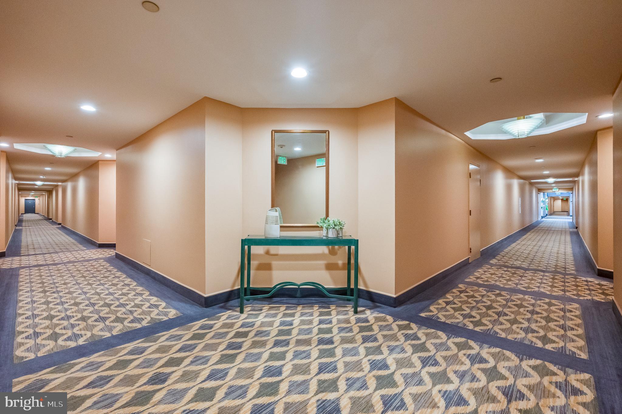 4001 Old Court Road, Unit 218 Baltimore, MD 21208 - Photo 44 of 44 a bathroom with a mirror and a shower