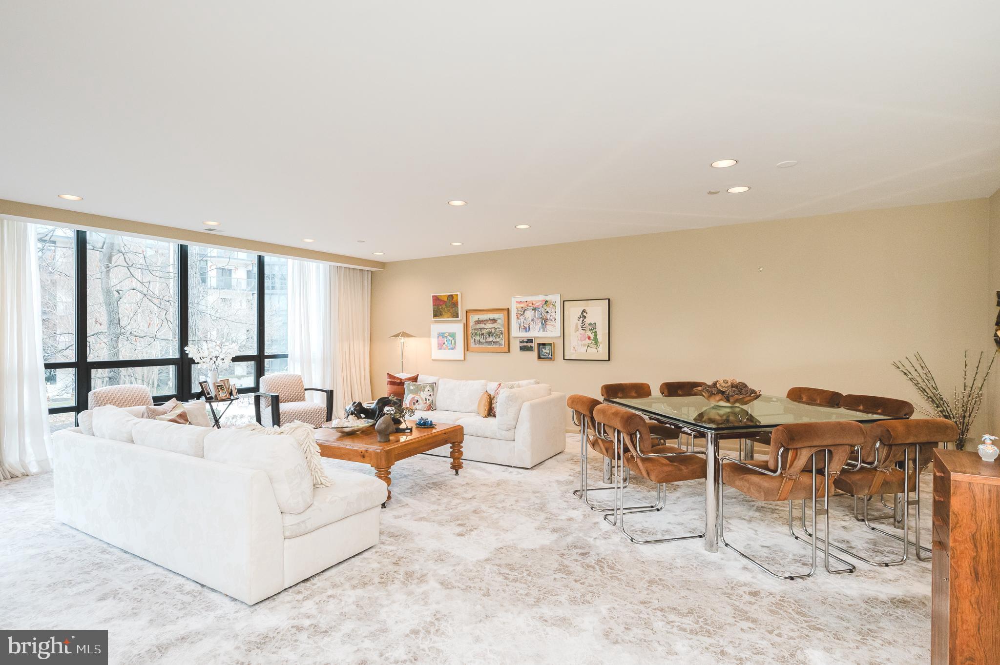 4001 Old Court Road, Unit 218 Baltimore, MD 21208 - Photo 6 of 44 a living room with furniture and a large window