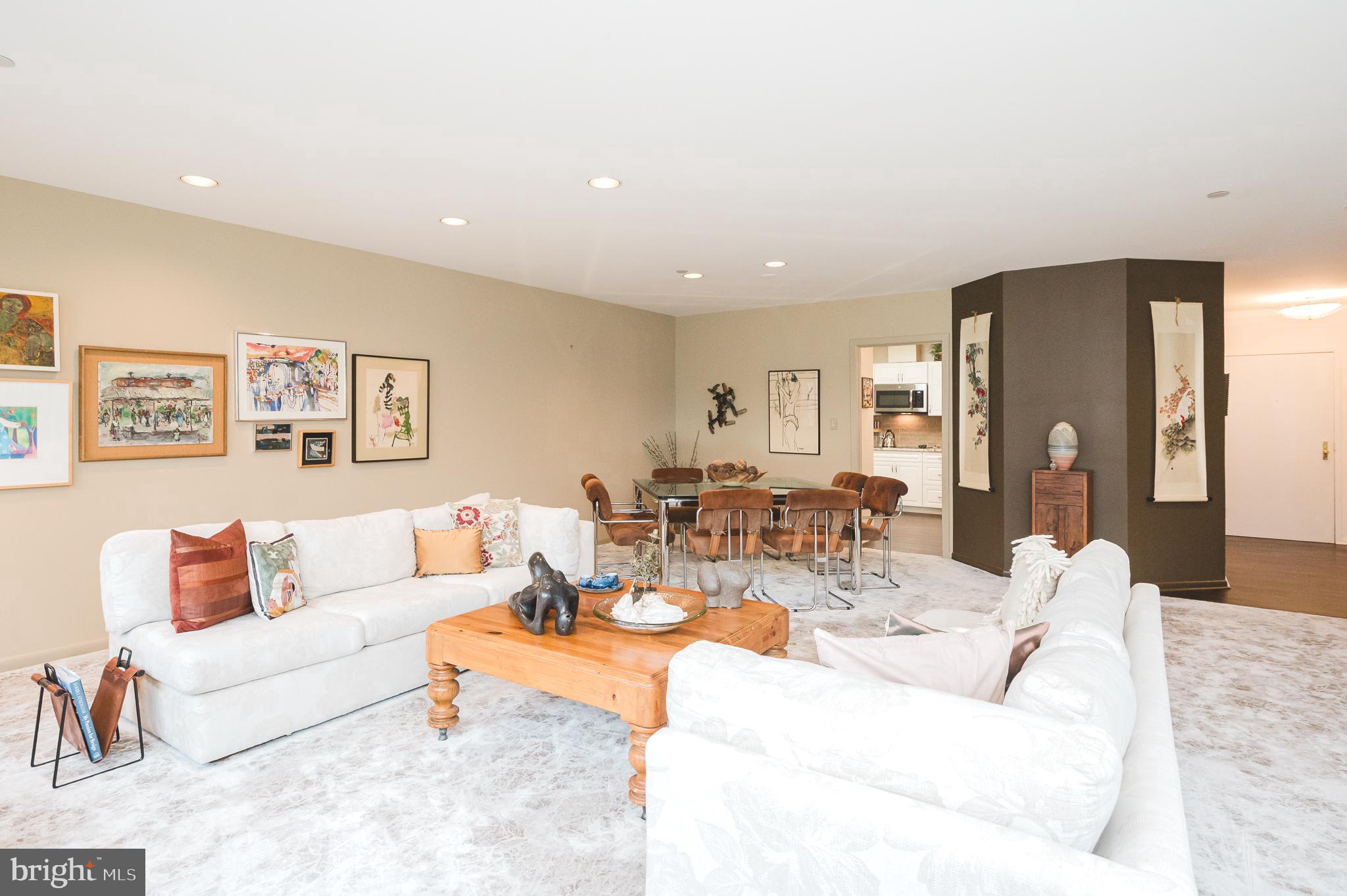 4001 Old Court Road, Unit 218 Baltimore, MD 21208 - Photo 8 of 44 a living room with furniture and wooden floor