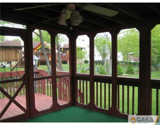 96 Magnolia Road Iselin, NJ 08830 - Photo 7 of 18 a view of a porch with porch