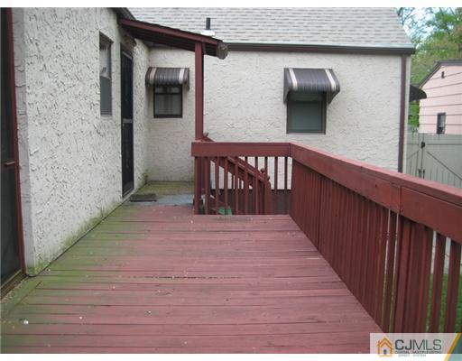 96 Magnolia Road Iselin, NJ 08830 - Photo 9 of 18 a view of a balcony with furniture