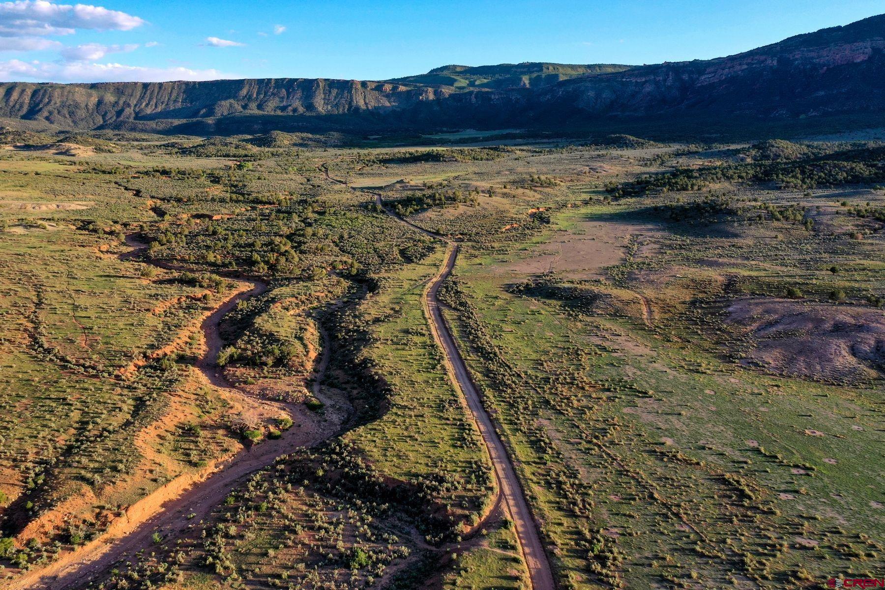 Undisclosed Address Gateway, CO 81522 - Photo 39 of 45 a view of a water with a mountain