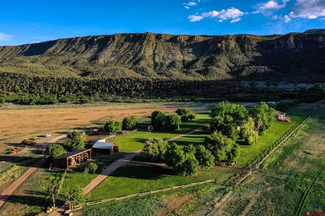 a view of a lake with a yard